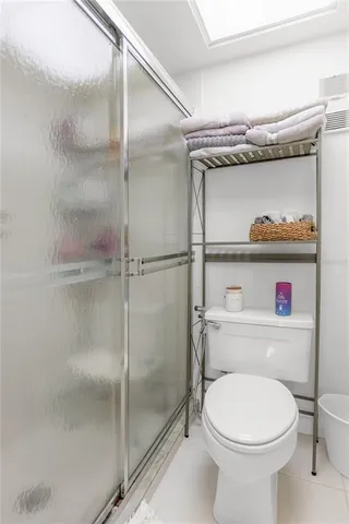 a view of swimming pool with seating area