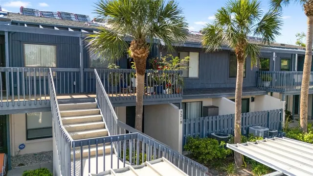 a view of swimming pool in front of building