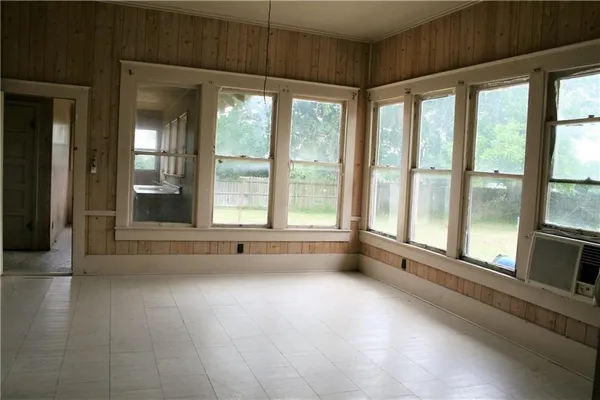 a view of room with window and floor to ceiling window