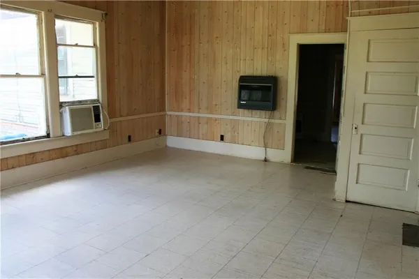an empty room with windows
