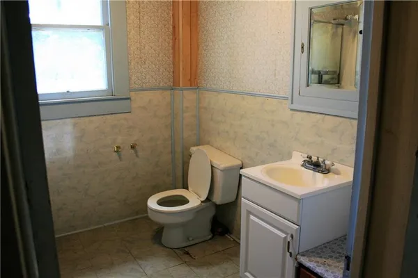 a bathroom with a sink and a toilet