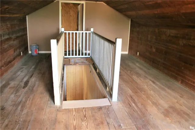 a view of entryway with wooden floor