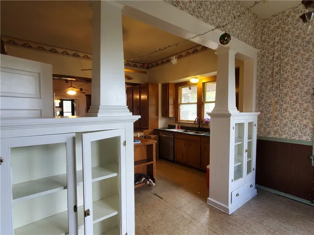 a view of a kitchen with furniture and a kitchen