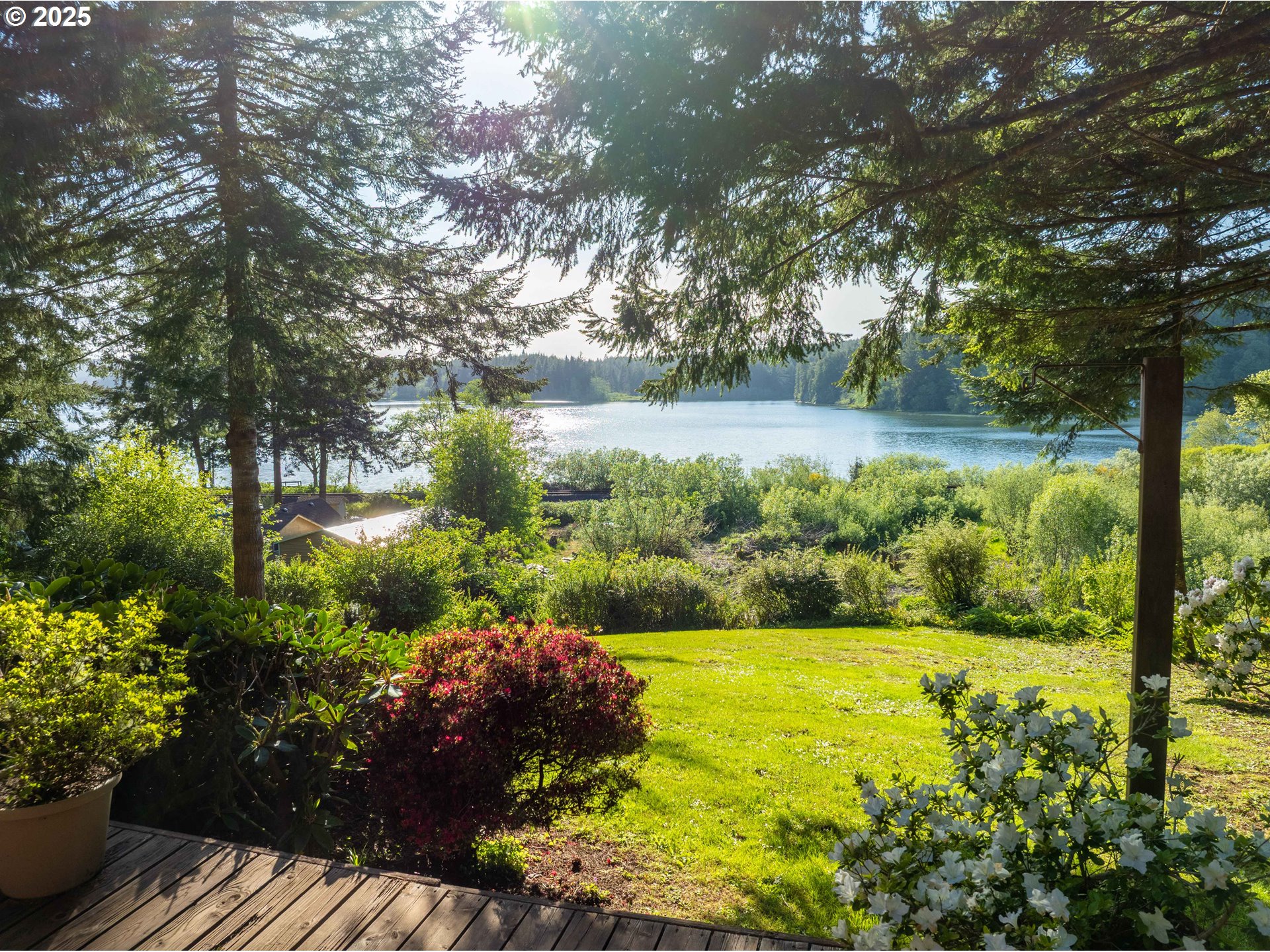 83049 Siltcoos Station Road Westlake, OR 97493 - Photo 2 of 48 a view of lake with green space