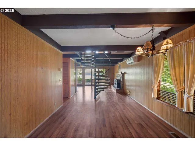 a view interior of a house wooden floor and an entryway