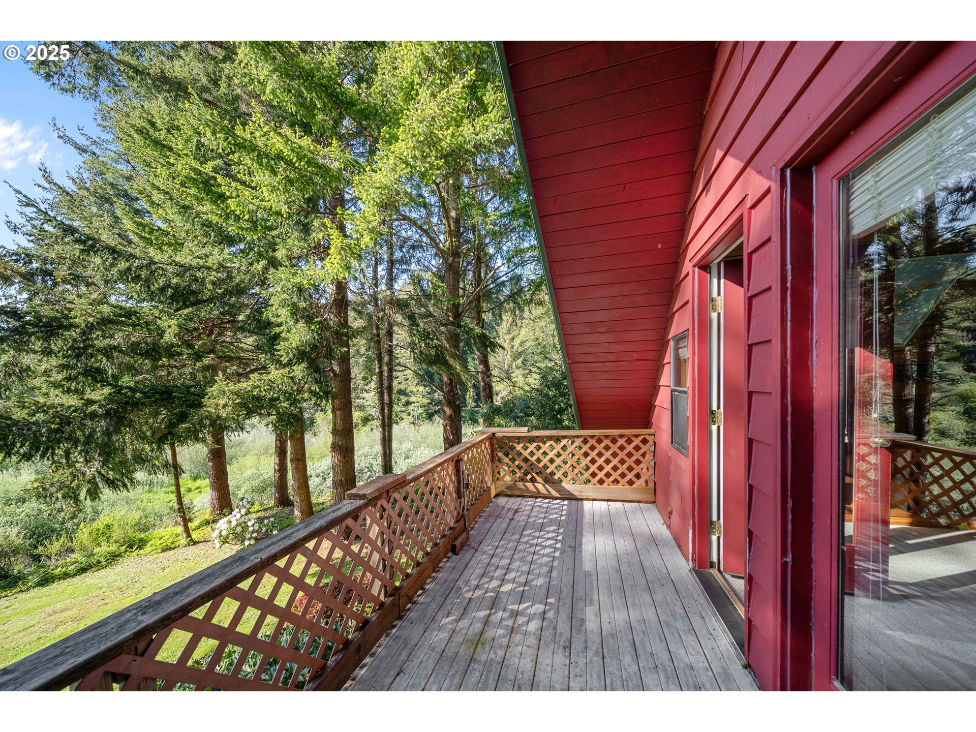 83049 Siltcoos Station Road Westlake, OR 97493 - Photo 39 of 48 a view of balcony with wooden floor