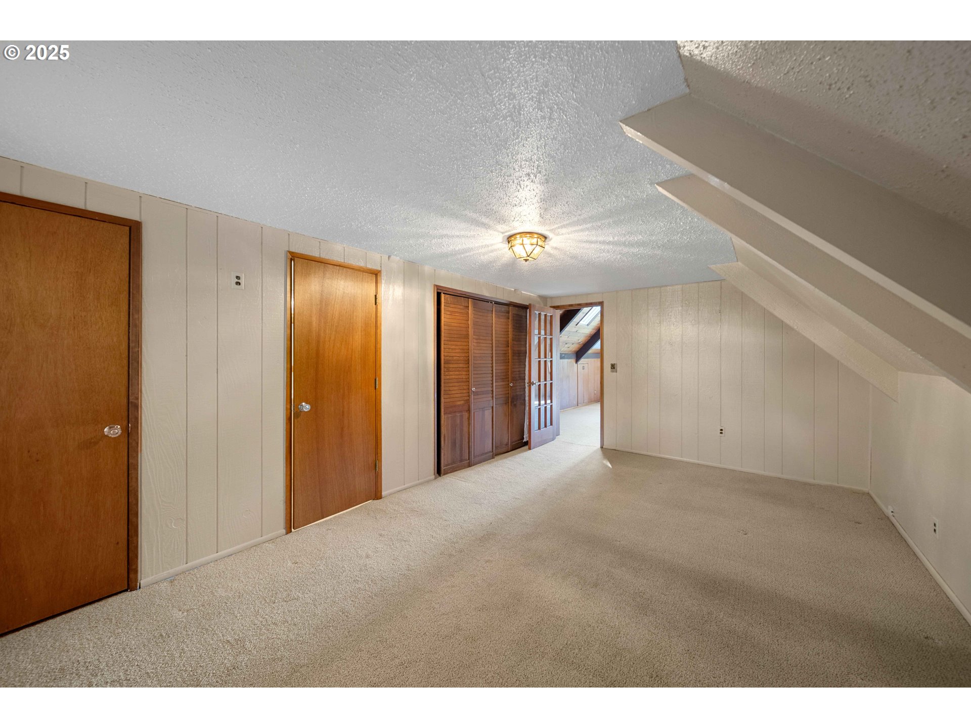 83049 Siltcoos Station Road Westlake, OR 97493 - Photo 41 of 48 a view of an empty room with wooden floor