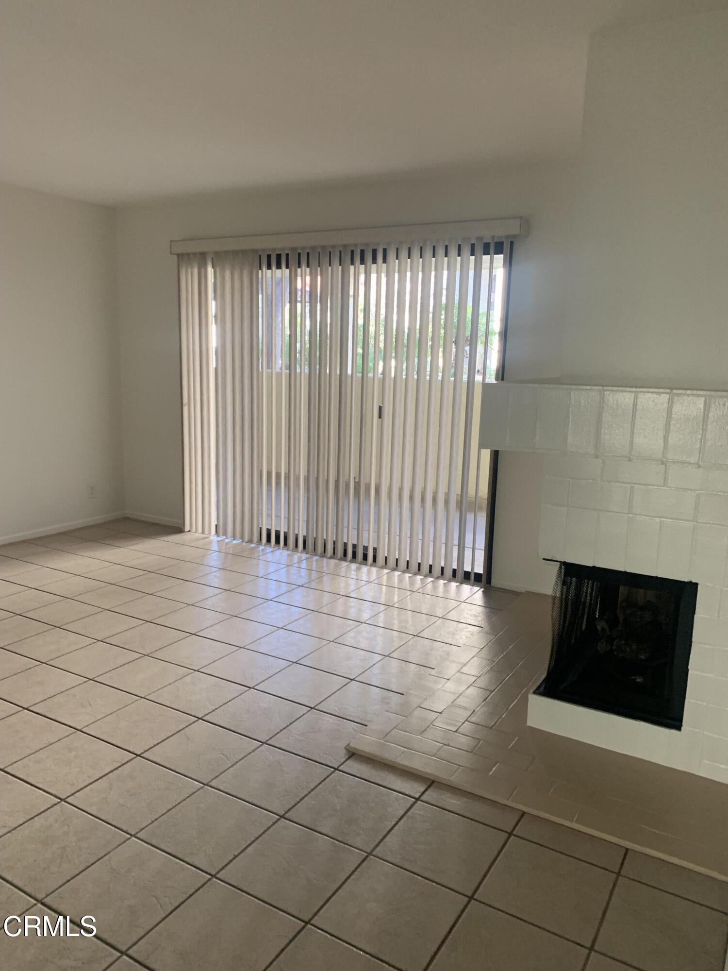 4455 Antigua Way Oxnard, CA 93035 - Photo 5 of 26 a view of an empty room with glass door