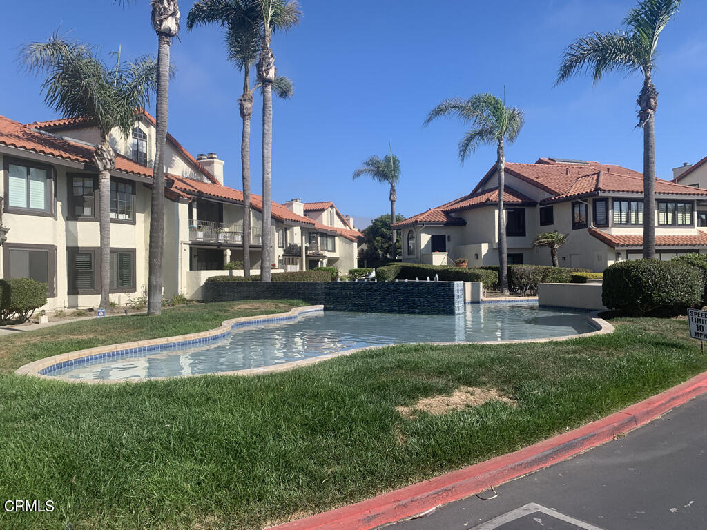 4455 Antigua Way Oxnard, CA 93035 - Photo 6 of 26 a view of a house with a swimming pool