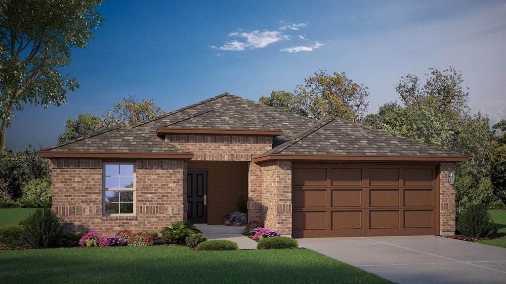 3026 Graduation Road Abilene, TX 79606 - Photo 1 of 1 a front view of a house with a yard and garage