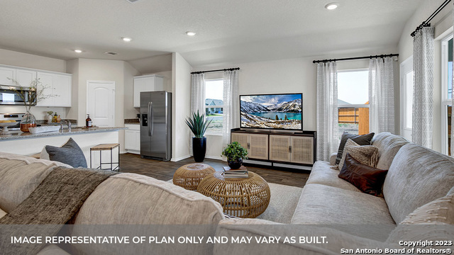 1008 Village Run Seguin, TX 78155 - Photo 19 of 39 a living room with furniture and a large window
