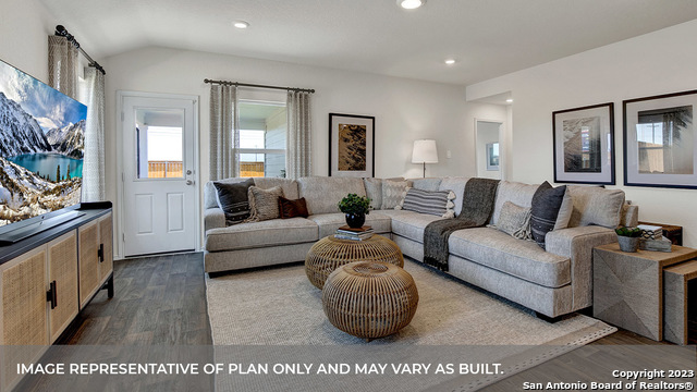 1008 Village Run Seguin, TX 78155 - Photo 21 of 39 a living room with furniture and a flat screen tv