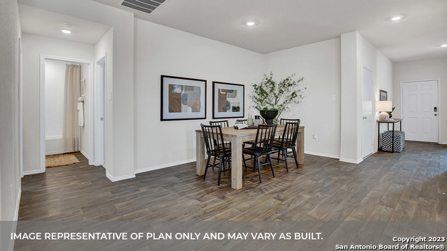 1008 Village Run Seguin, TX 78155 - Photo 23 of 39 a view of a dining room with furniture and wooden floor