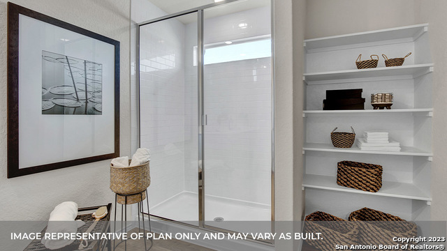 1008 Village Run Seguin, TX 78155 - Photo 33 of 39 a living room with furniture and a painting on the wall