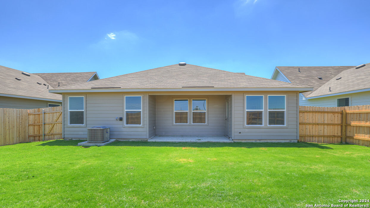1008 Village Run Seguin, TX 78155 - Photo 36 of 39 a view of a house with a backyard