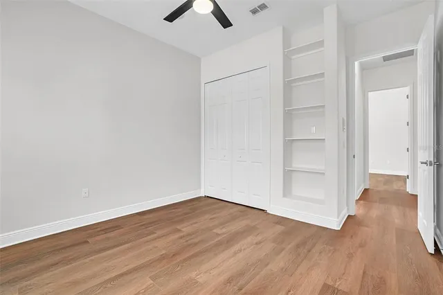 an aerial view of a houses with a lake view