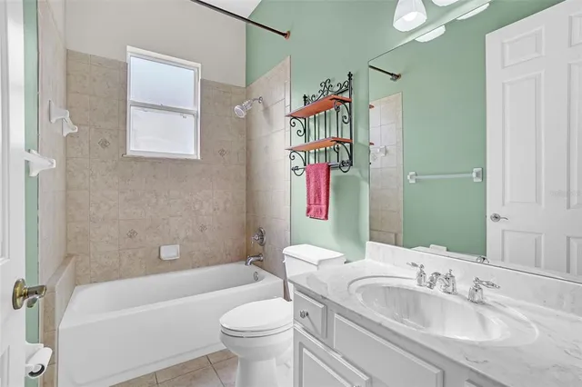 an aerial view of residential house with outdoor space