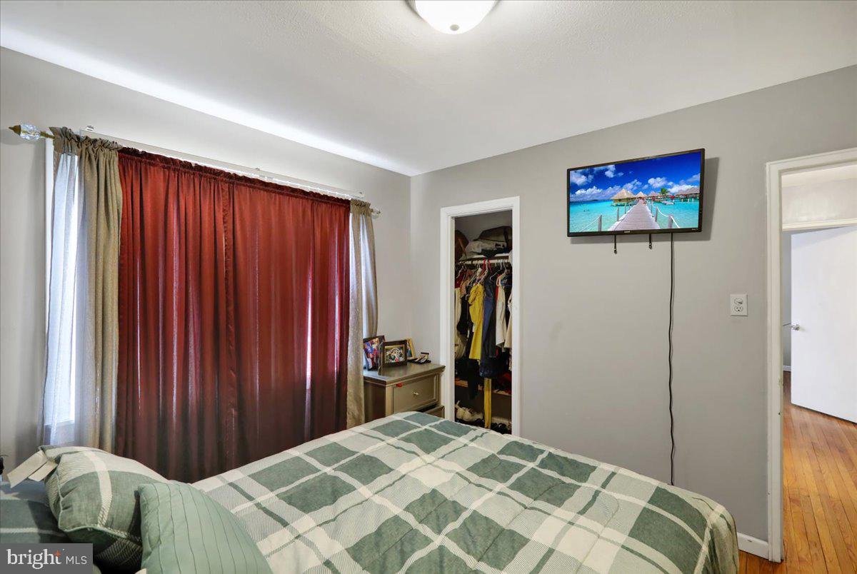 108 Gerald Avenue Reading, PA 19607 - Photo 22 of 25 a bedroom with a bed and a flat screen tv