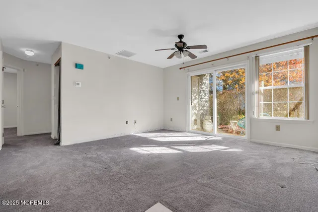 a kitchen that has a sink and a stove in it