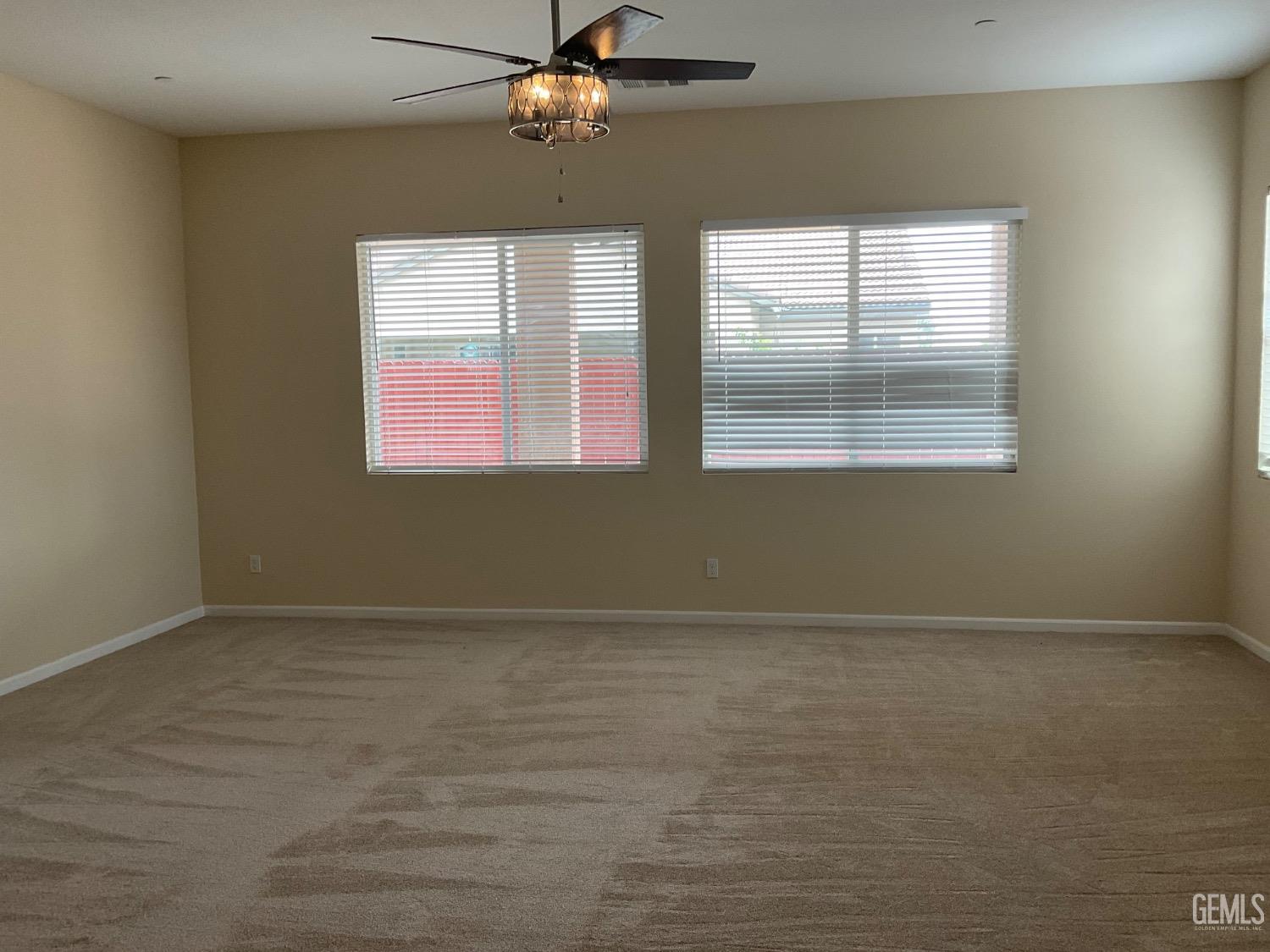 Undisclosed Address Bakersfield, CA 93314 - Photo 13 of 31 a view of an empty room with a window