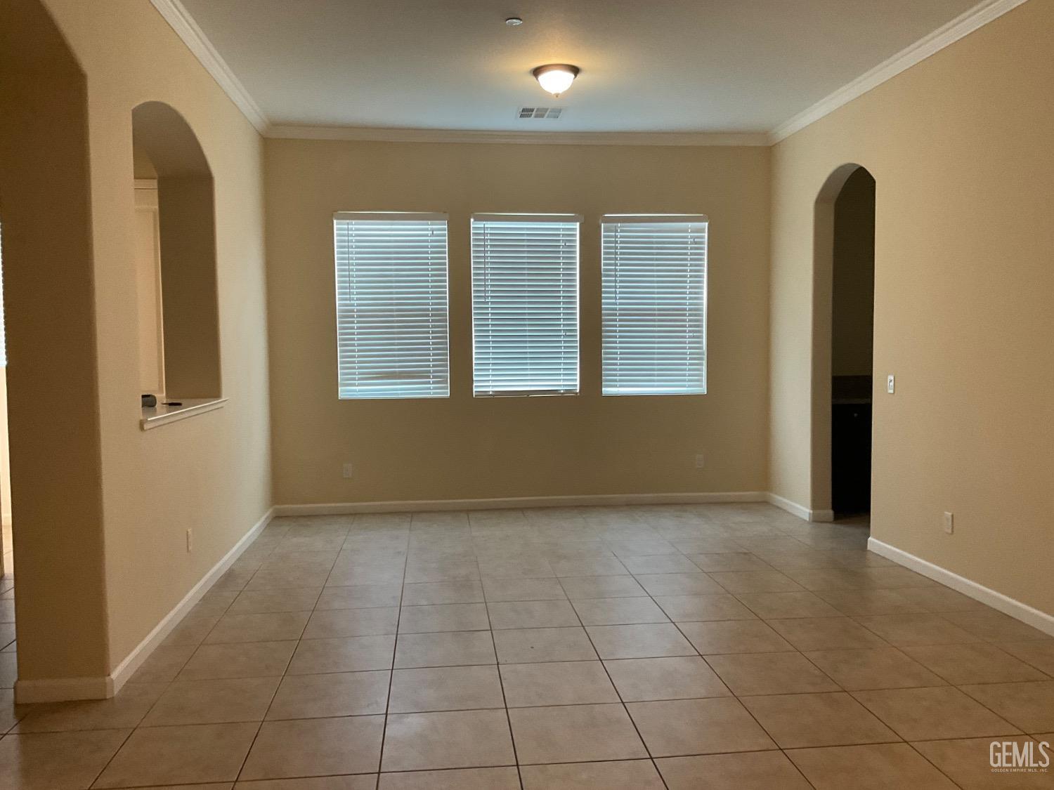 Undisclosed Address Bakersfield, CA 93314 - Photo 9 of 31 an empty room with windows