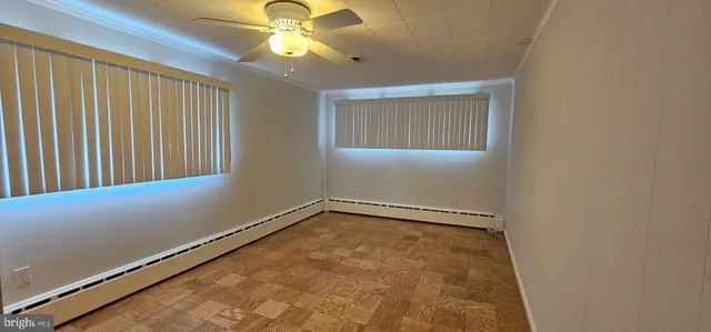 a view of a hallway with a window