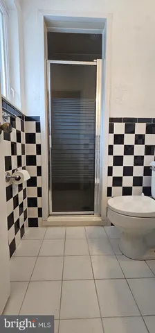 a view of a black and white checkered floor