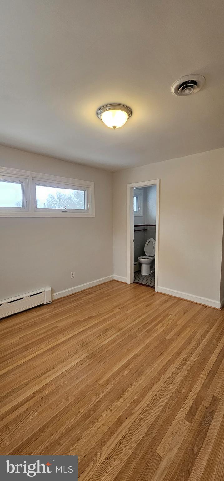 4202 Yates Road Beltsville, MD 20705 - Photo 10 of 35 a view of empty room with wooden floor