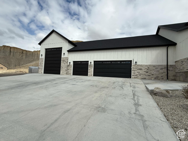 1240 West 2360 North Helper, UT 84526 - Photo 6 of 79 Garage featuring concrete driveway