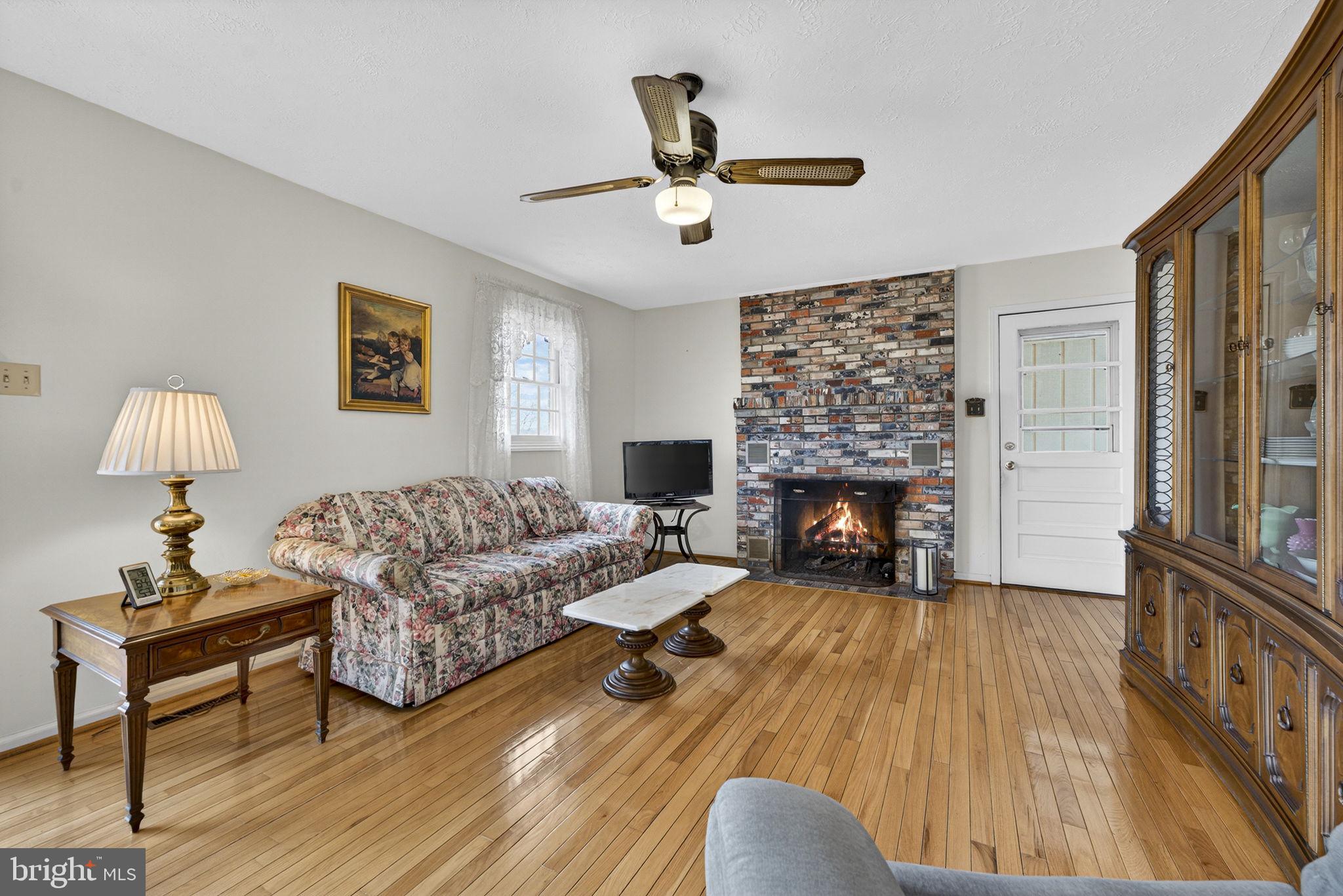 731 Kendrick Ford Road Front Royal, VA 22630 - Photo 20 of 85 a living room with furniture and a fireplace