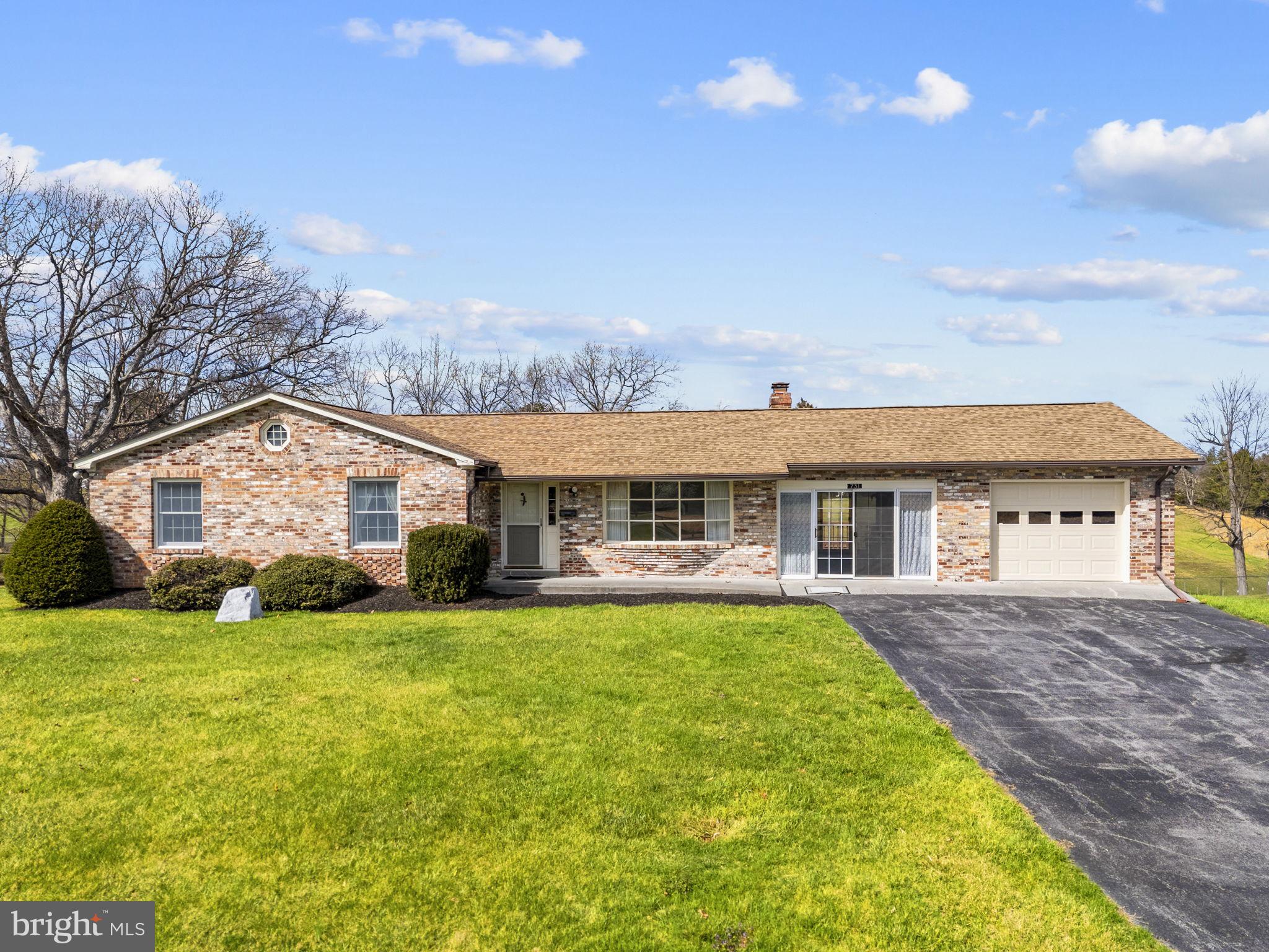 731 Kendrick Ford Road Front Royal, VA 22630 - Photo 2 of 85 a view of a house with a big yard and large trees