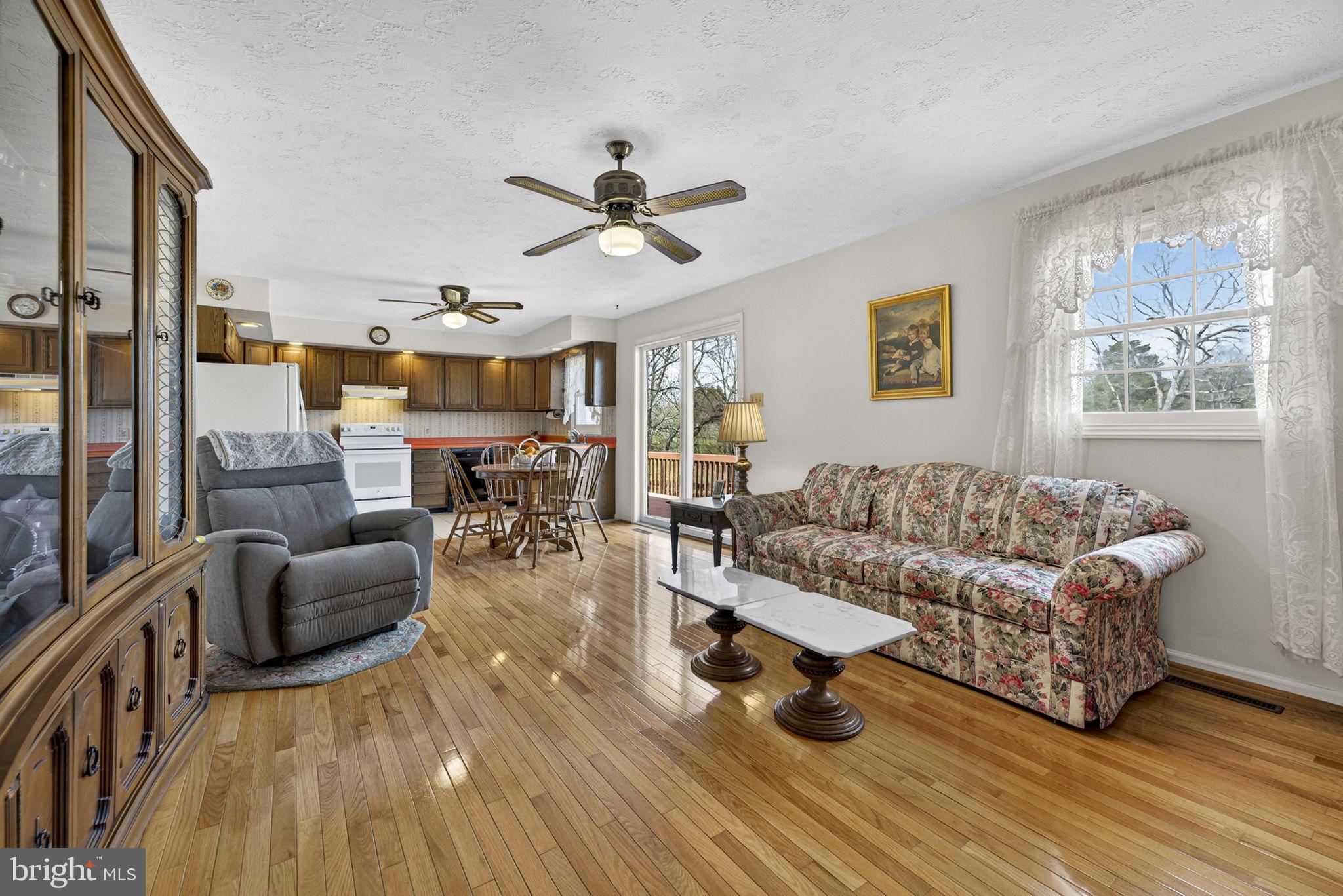 731 Kendrick Ford Road Front Royal, VA 22630 - Photo 21 of 85 a living room with furniture and a wooden floor