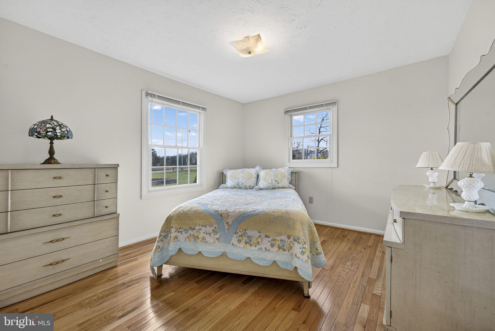 731 Kendrick Ford Road Front Royal, VA 22630 - Photo 28 of 85 a bedroom with a bed and a window