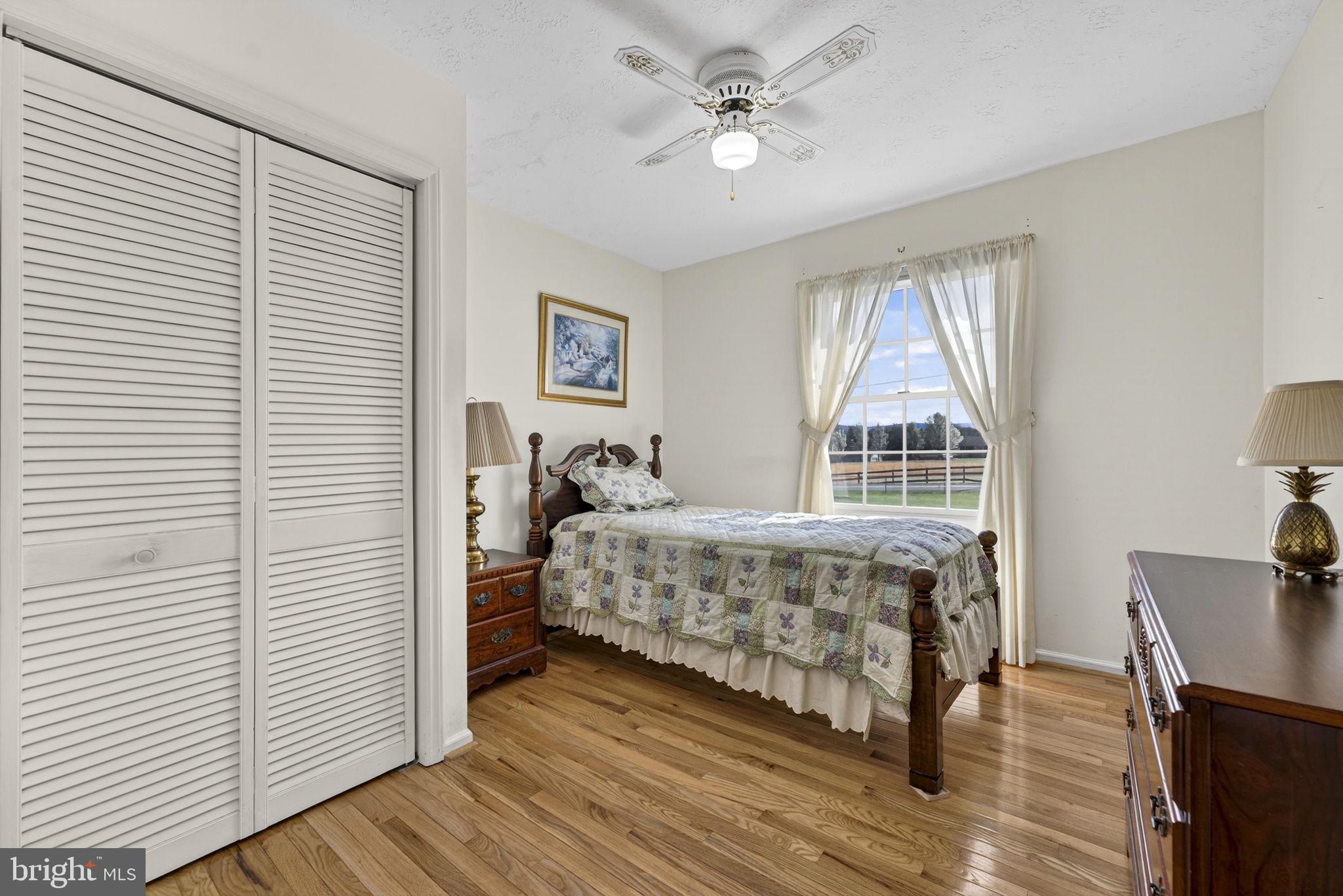 731 Kendrick Ford Road Front Royal, VA 22630 - Photo 30 of 85 a bedroom with a bed and a window