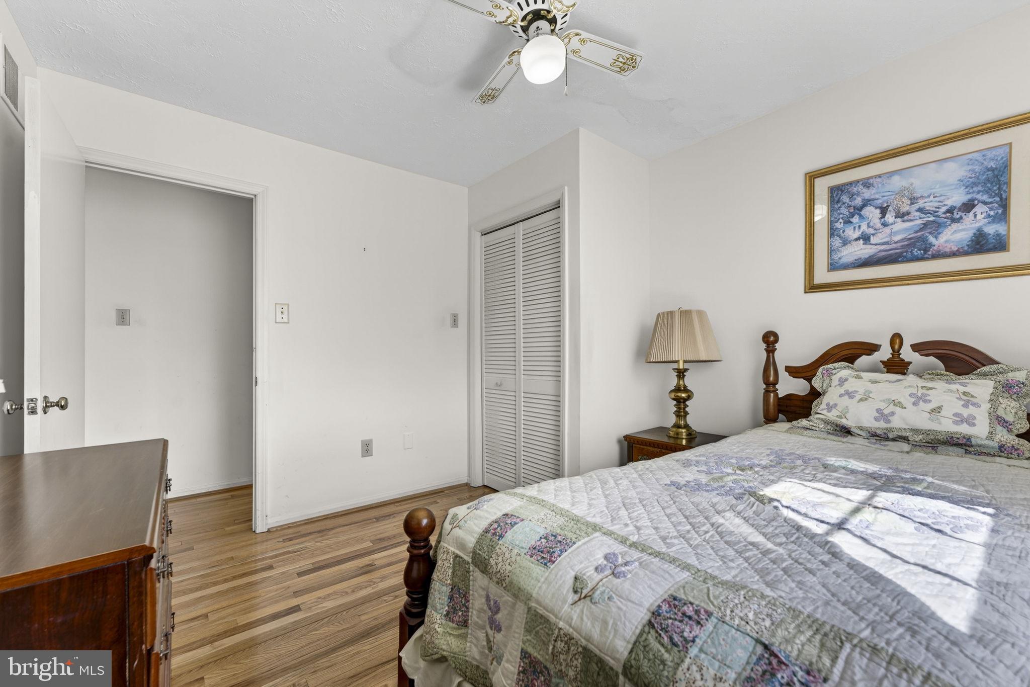 731 Kendrick Ford Road Front Royal, VA 22630 - Photo 31 of 85 a bedroom with a bed and wooden floor