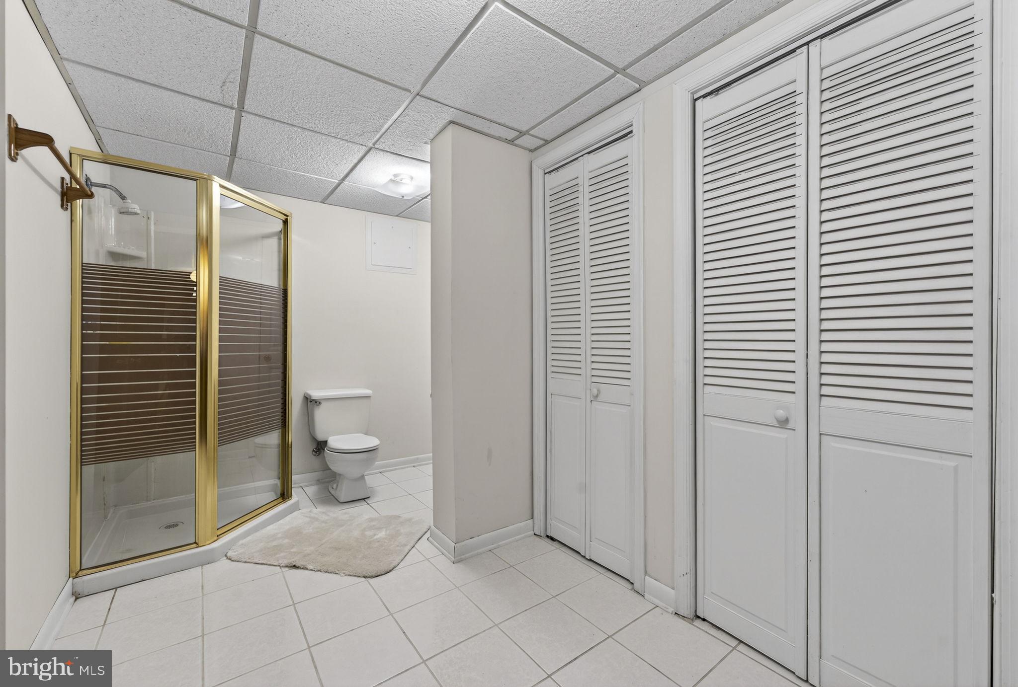 731 Kendrick Ford Road Front Royal, VA 22630 - Photo 33 of 85 a view of a bathroom with a glass door shower and a toilet