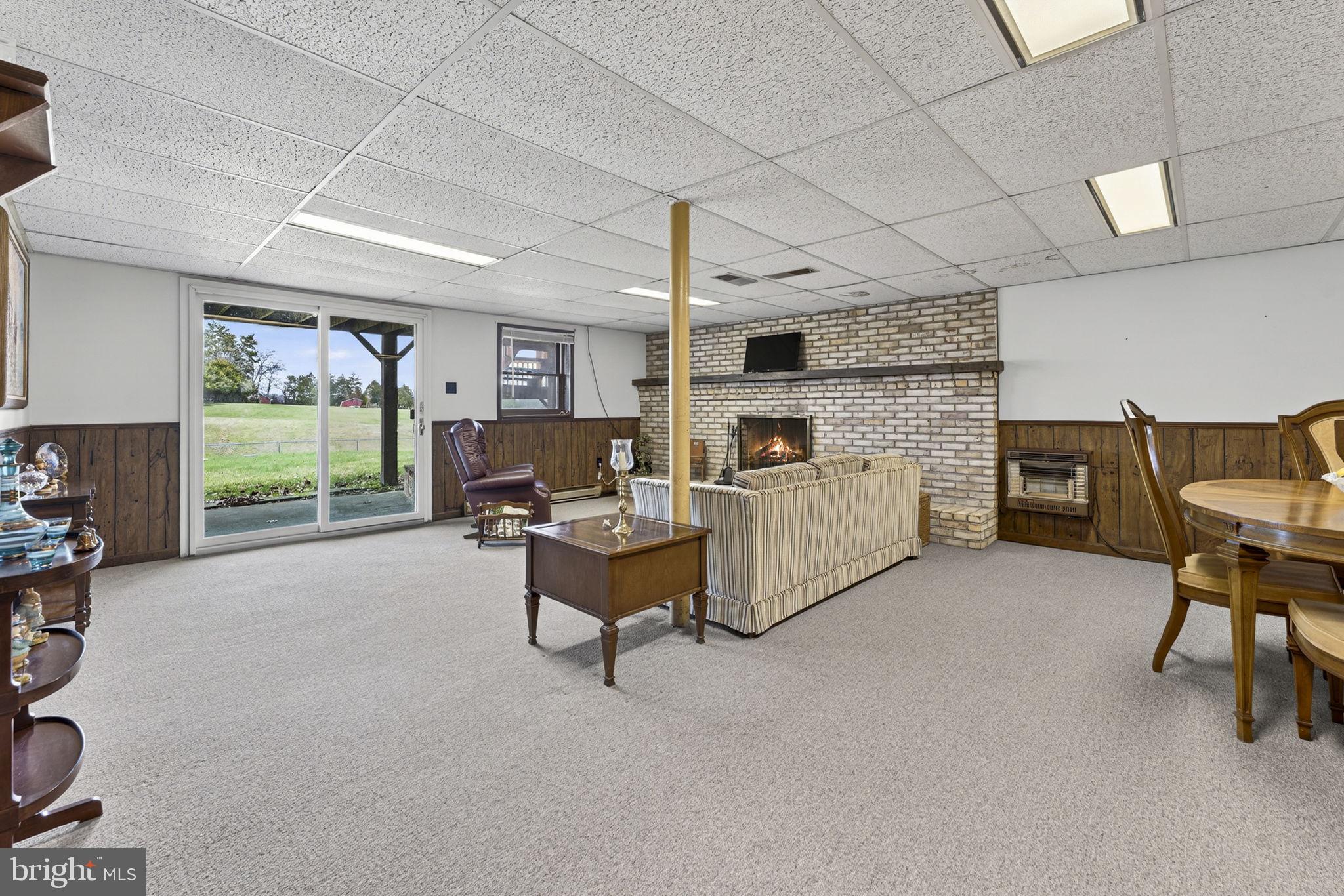 731 Kendrick Ford Road Front Royal, VA 22630 - Photo 40 of 85 a living room with furniture and a fireplace