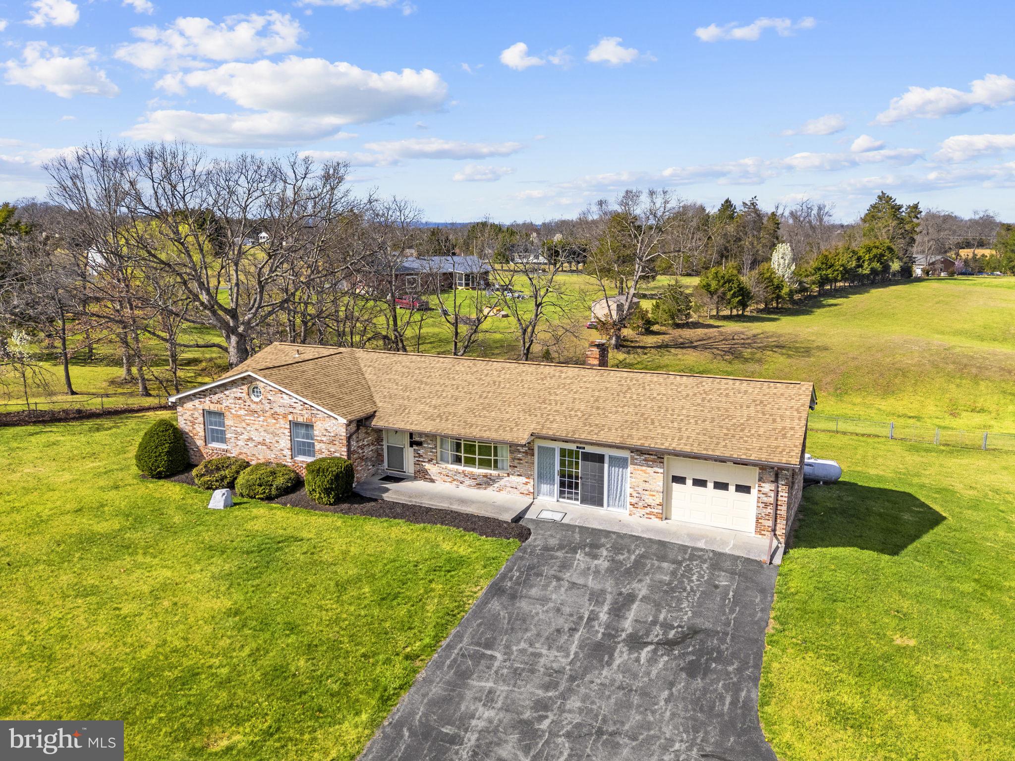 731 Kendrick Ford Road Front Royal, VA 22630 - Photo 4 of 85 a aerial view of a house with a garden and lake view