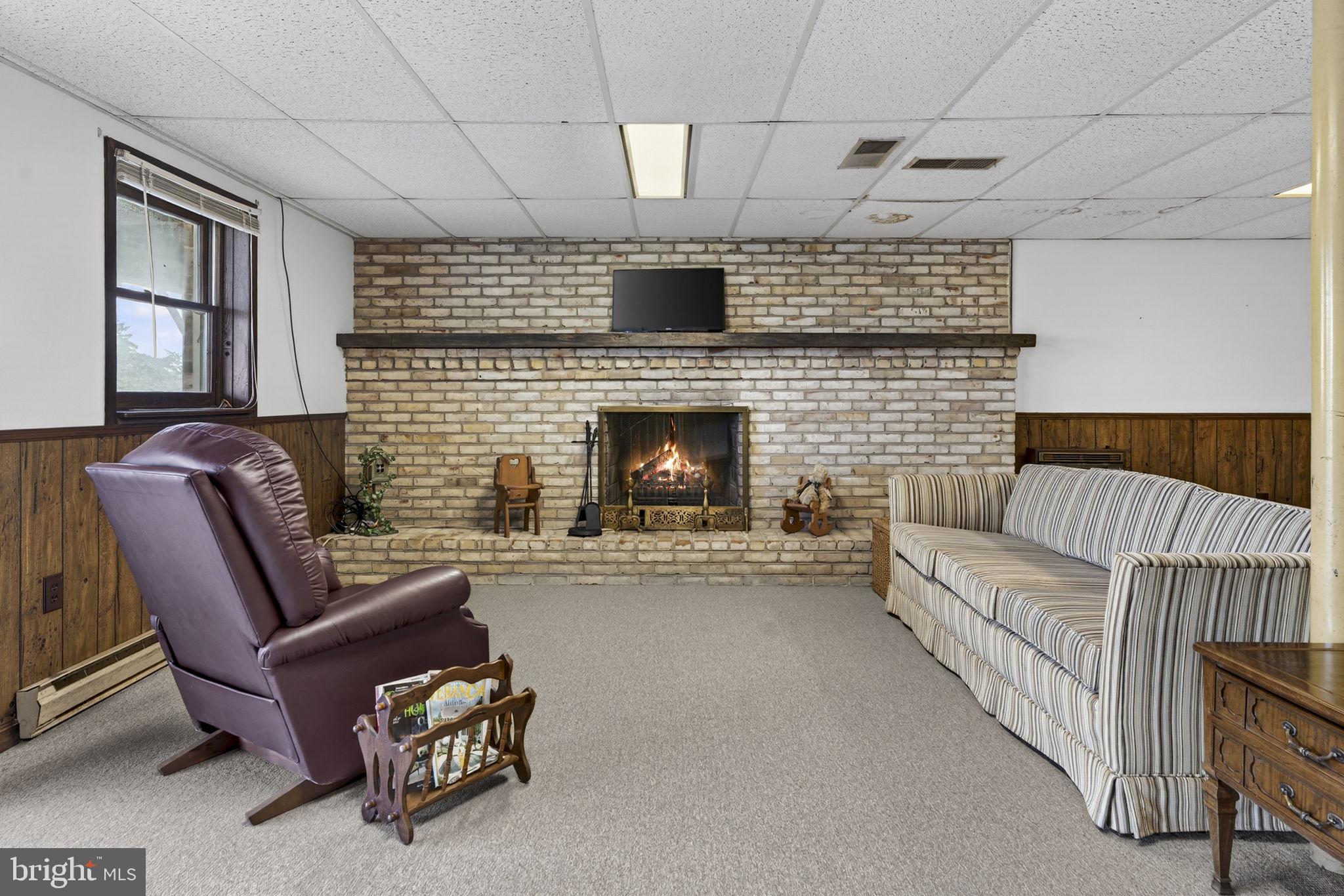 731 Kendrick Ford Road Front Royal, VA 22630 - Photo 41 of 85 a living room with furniture and a fireplace