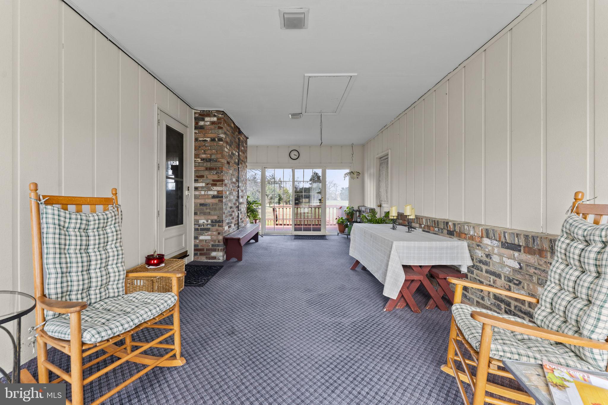 731 Kendrick Ford Road Front Royal, VA 22630 - Photo 53 of 85 a living room with furniture and a flat screen tv