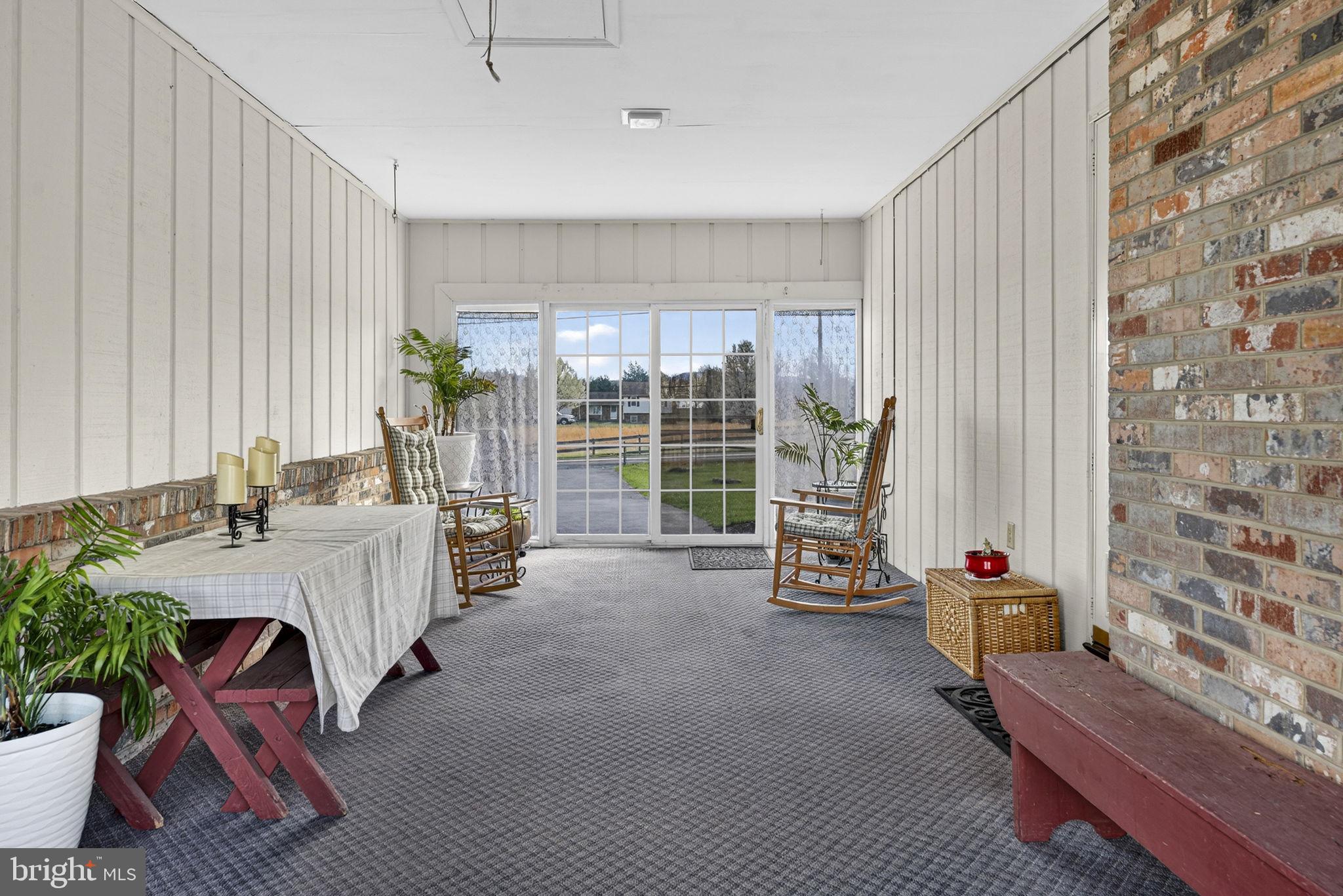 731 Kendrick Ford Road Front Royal, VA 22630 - Photo 55 of 85 a living room with furniture and a fireplace