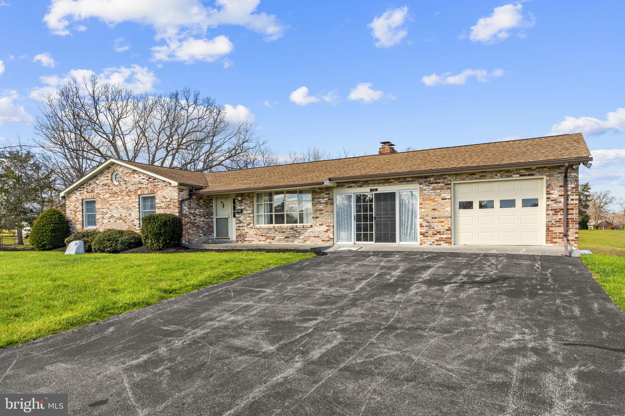 731 Kendrick Ford Road Front Royal, VA 22630 - Photo 56 of 85 a view of a house with a yard and pathway