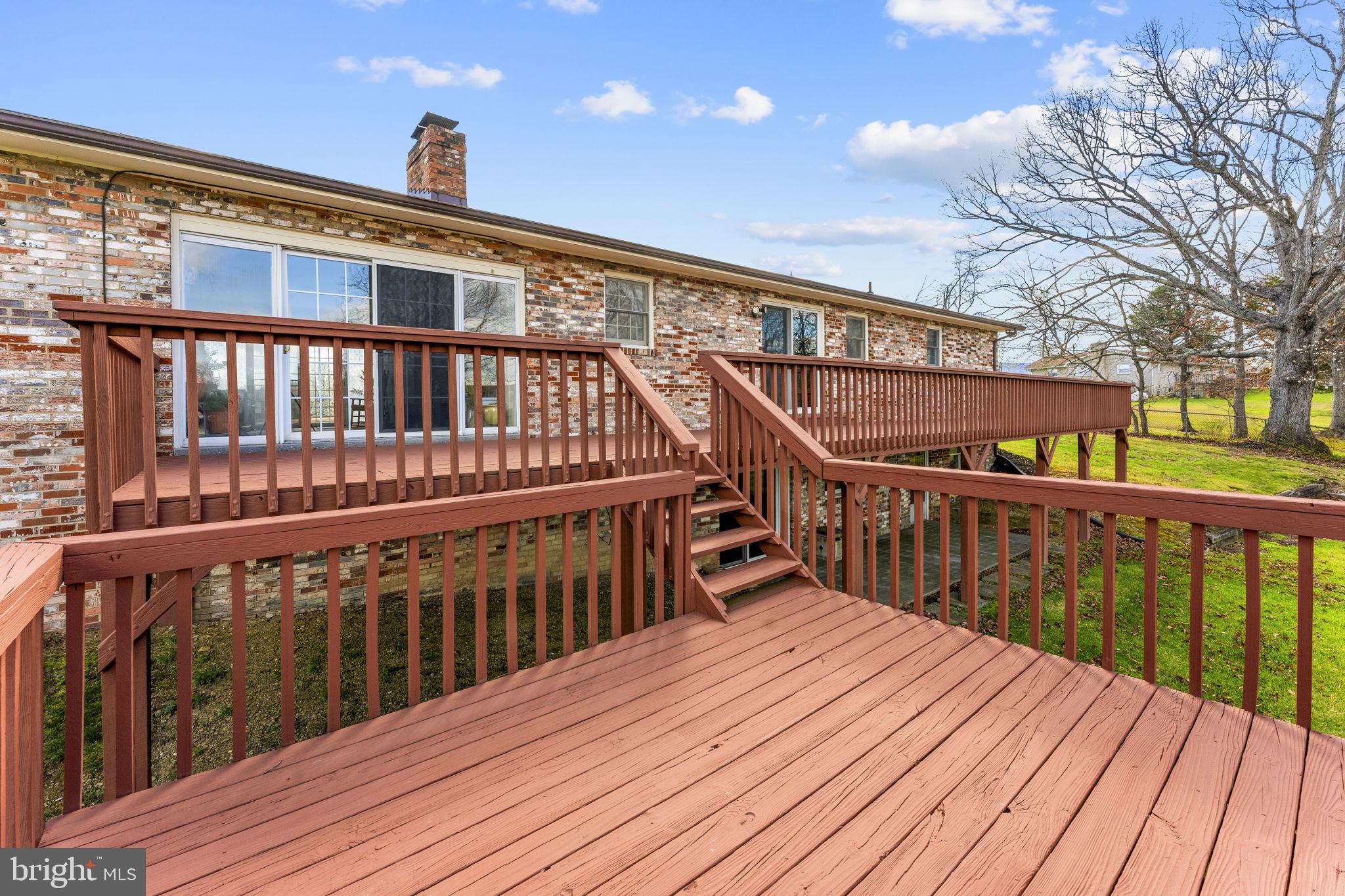 731 Kendrick Ford Road Front Royal, VA 22630 - Photo 60 of 85 a balcony with wooden floor outdoor seating and yard in the back