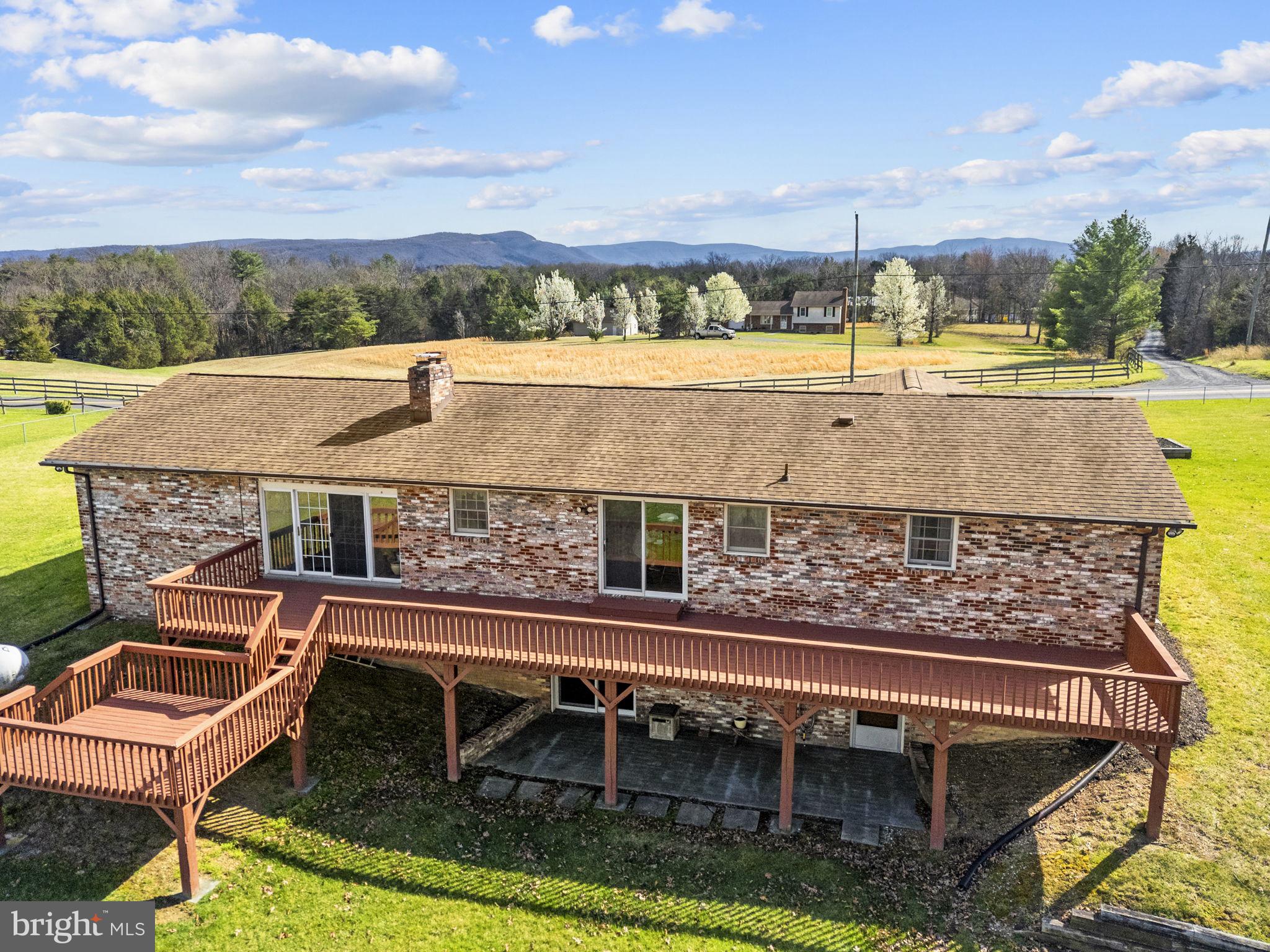 731 Kendrick Ford Road Front Royal, VA 22630 - Photo 69 of 85 an aerial view of a house with a swimming pool