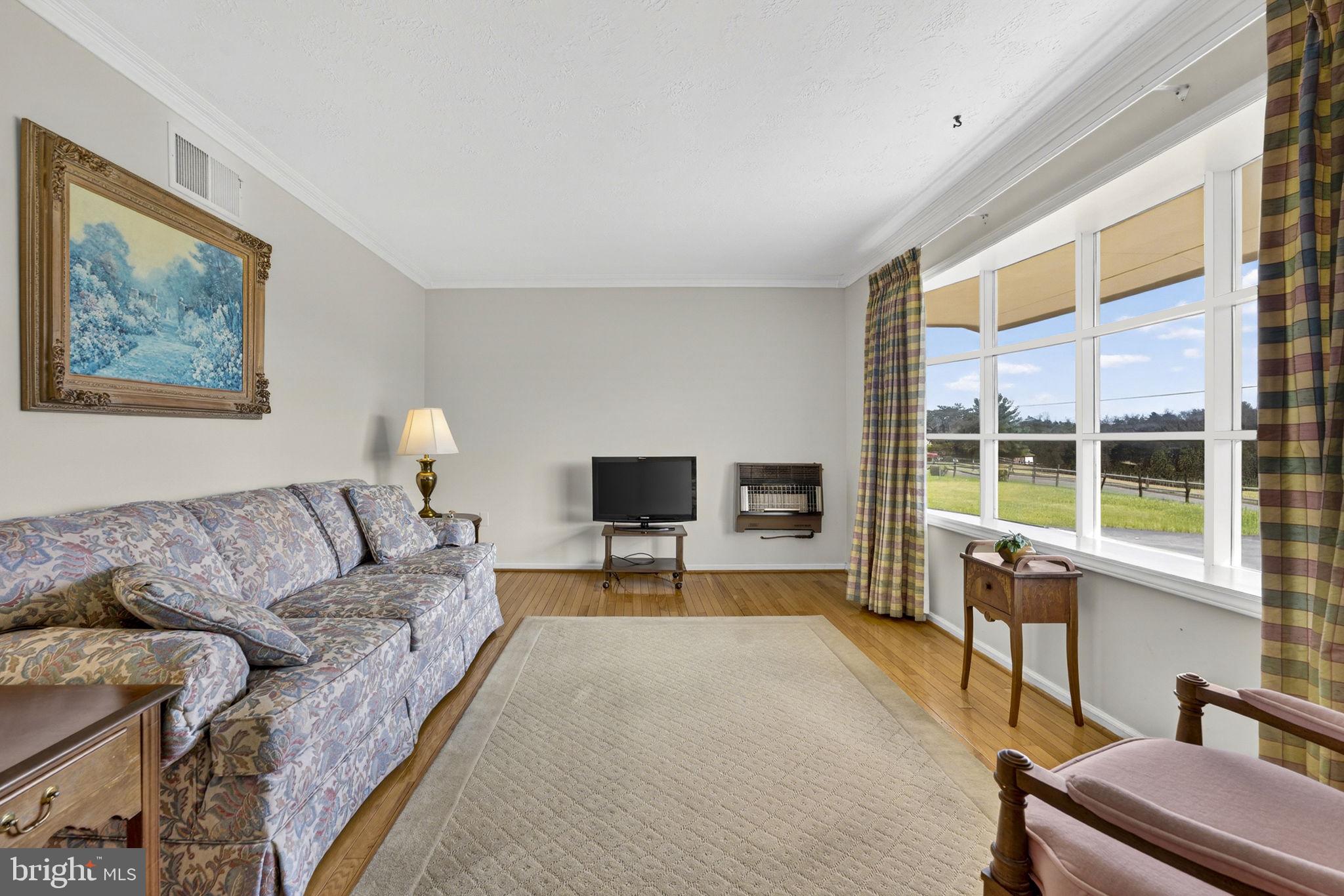 731 Kendrick Ford Road Front Royal, VA 22630 - Photo 8 of 85 a living room with furniture and a large window
