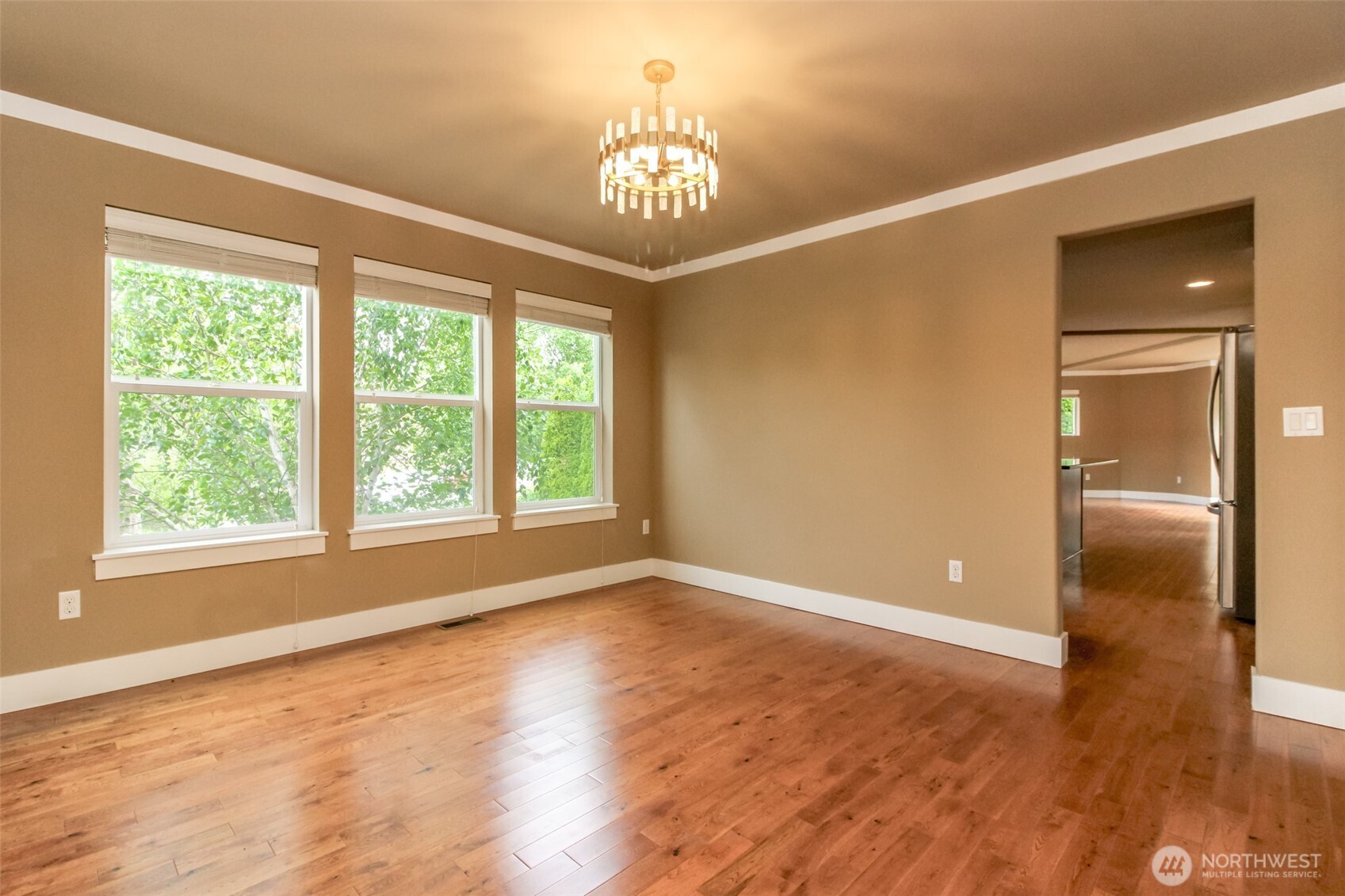 3000 South Mt Baker Boulevard Seattle, WA 98144 - Photo 9 of 40 a view of an empty room with window and wooden floor