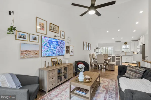 a room with furniture and a flat screen tv