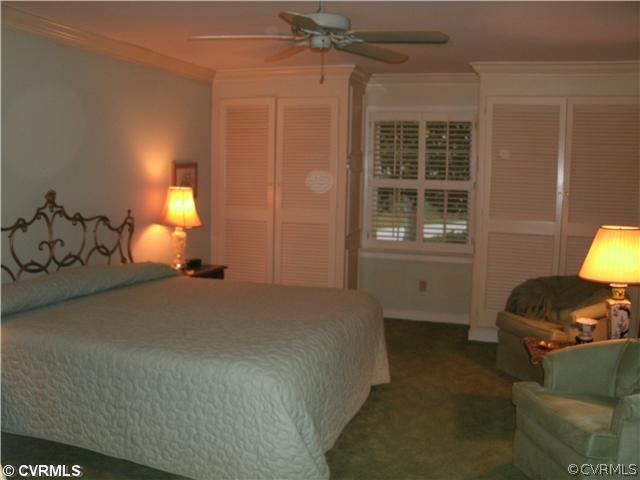 4100 Cresthill Road Chester, VA 23831 - Photo 3 of 7 a bed room with a bed and a window