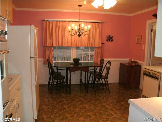 4100 Cresthill Road Chester, VA 23831 - Photo 5 of 7 a view of a dining room with furniture window and outside view