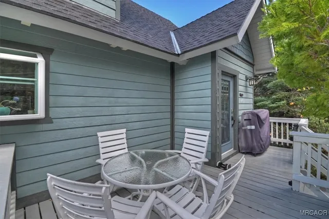 a backyard of a house with seating space